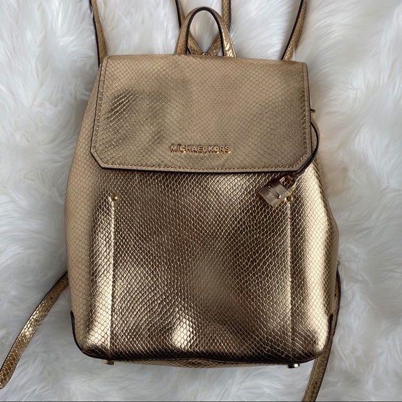 Michael Kors Handbags - Michael Kors Hayes Gold Embossed Backpack